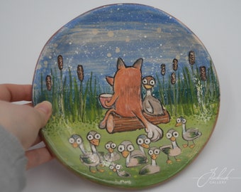 Decorative ceramic plate with fox and duck