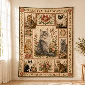 May include: A rectangular wall quilt featuring a central large gray tabby cat surrounded by seven smaller panels depicting various cat breeds, floral arrangements, and geometric star patterns, all framed by a decorative floral border in beige tones.