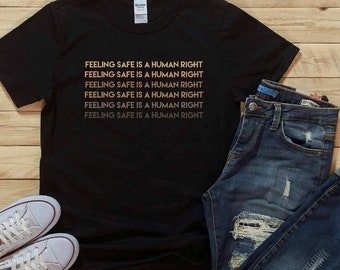 Sentirse seguro es una camisa de derechos humanos, black pride women, camisa black girl, BLM ally, Black Lives Matter, igualdad racial, camisa negra de historia