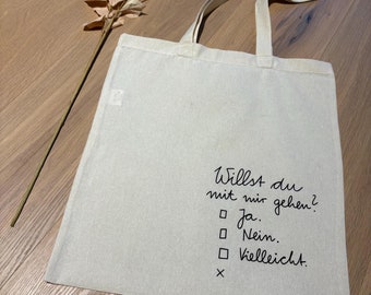 Jute bag with the inscription 'Will you go out with me?'