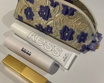 Cream-colored jacquard cosmetic bag / pencil case with lilac flowers and gold threads