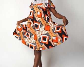 Robe ovale avec poche intérieure en wax africain. African wax dress, ankara fashions