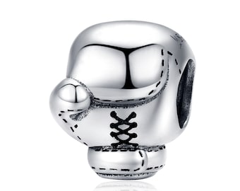 May include: Silver charm in the shape of a boxing glove with black stitching and a black lace-up detail.