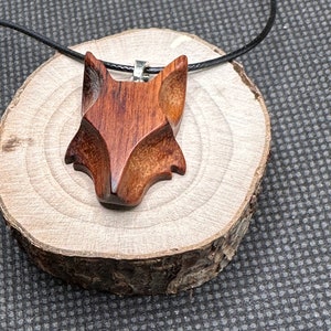 Fox head pendant in lovewood wood