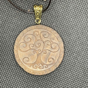 &quot;Tree of life&quot; pendant in carved wood
