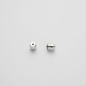 May include: Two silver-toned metal earring backs with a bullet-shaped design. Each piece features a smooth, polished surface and a small central opening intended to secure an earring post, presented in both a front-facing and side-profile view.
