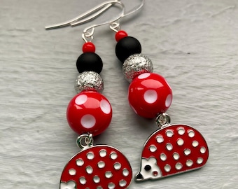 Valentine’s Day Hedgehog Charm Earrings with Stacks of Black, Silver, Red, and White Beads