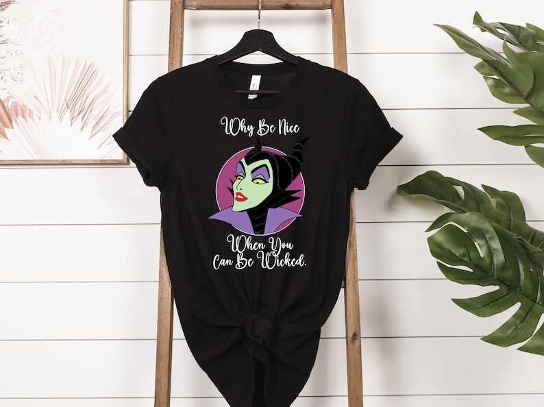 May include: Black t-shirt with a graphic of Maleficent from Disney's Sleeping Beauty. The text on the shirt reads "Why Be Nice When You Can Be Wicked."