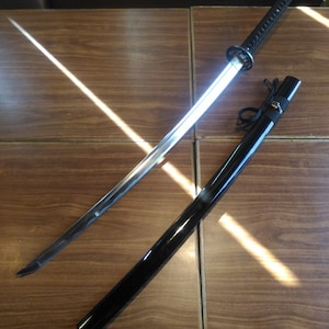 I think the Murasama is a Tachi, not a katana. : r/metalgearrising