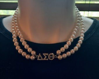 Delta Sigma Theta 2 strand choker style pearl necklace with DST lettering