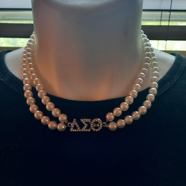 Delta Sigma Theta 2 strand choker style pearl necklace with DST lettering