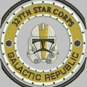 May include: A round, white and gold patch with the text "327th STAR CORPS GALACTIC REPUBLIC" in a circle around a white and yellow clone trooper helmet.