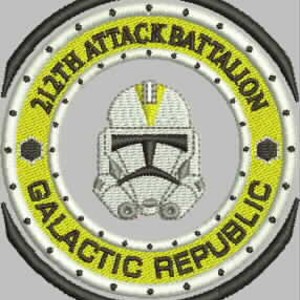 May include: A yellow and white embroidered patch with a white clone trooper helmet in the center. The text "212th Attack Battalion Galactic Republic" is written in a circle around the helmet.