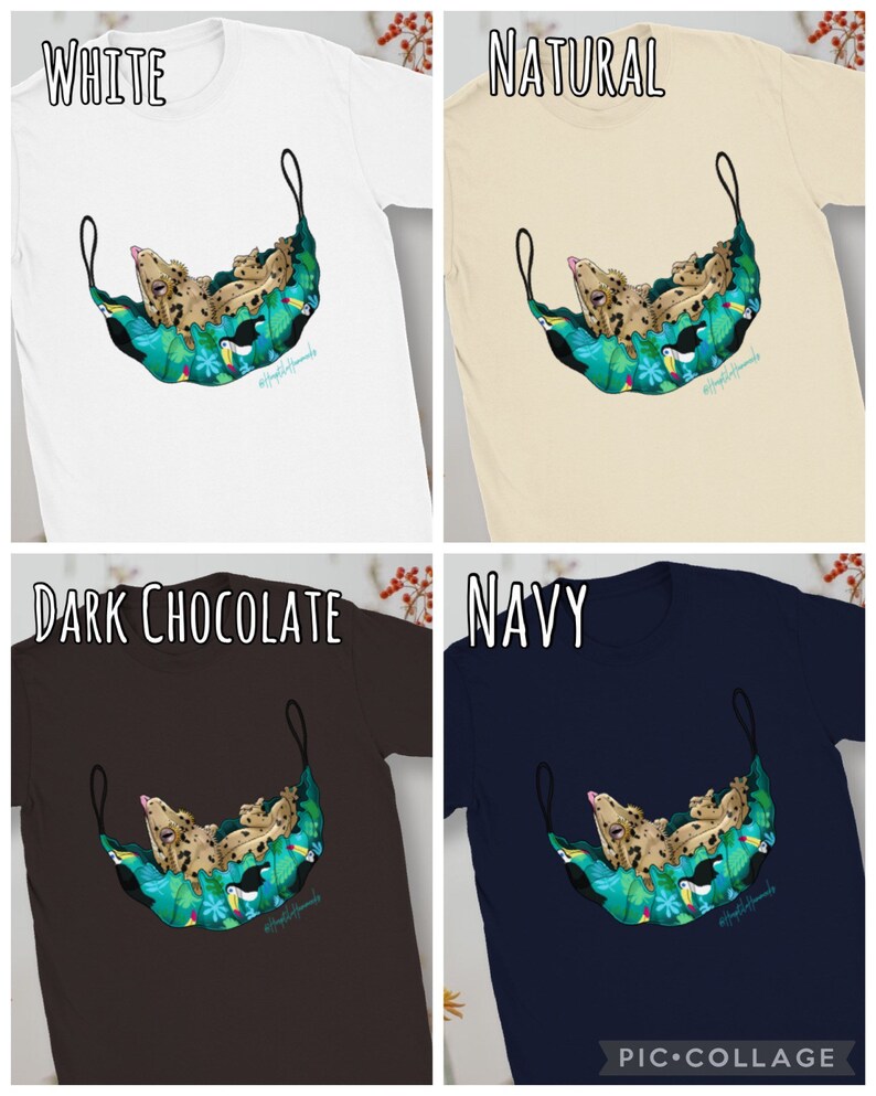 May include: White, natural, dark chocolate, and navy t-shirts. Each shirt features a graphic of a gecko in a hammock with toucans and tropical foliage. The text "#reptilemoments" is printed on the design.