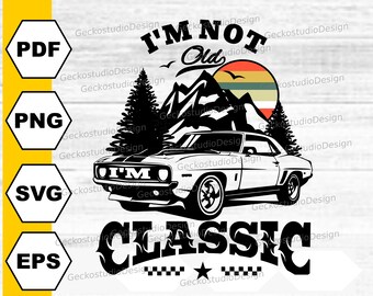 May include: Black and white graphic design featuring a vintage muscle car with the text "I'm Not Old, I'm Classic" and a mountain scene with a sunset in the background.