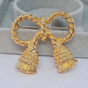 Broche de borla vintage