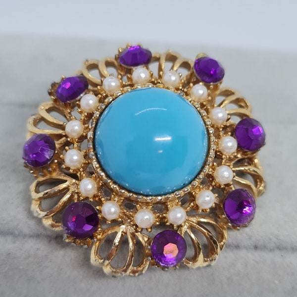 Vintage floral brooch with blue plastic cabochon Gold tone metal with plastic purple rhinestones and faux micro pearls brooch pin