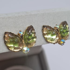WEST GERMANY molded glass clip earrings Gold tone metal with green glass and AB rhinestones Vintage art glass clip-on earrings