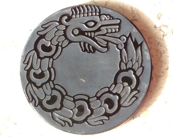 Quetzalcoatl engraved in obsidian gemstone symbol Kukulcan feathered serpent
