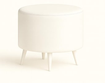 May include: A white, round ottoman with a cylindrical body and three angled legs. The top is a solid, smooth surface. The legs are evenly spaced and provide support. The ottoman is a neutral color, suitable for various interior design styles.