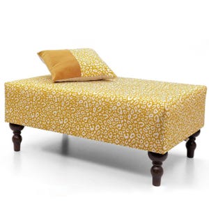 Coffee table decor | wood and upholstery coffee table | Mustard yellow animal pattern| upholstered pouffe|patterned smooth seat footstool