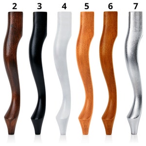 May include: Eight different chair legs in various finishes, including dark brown, black, white, light brown, medium brown, silver, and gold.