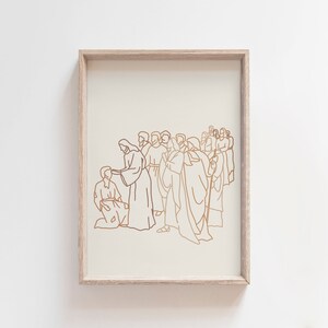 May include: A line drawing of a group of people in robes, with one person kneeling in front of the group. The drawing is in a gold color and is framed in a light wood frame.