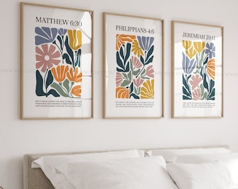 May include: Three printable wall art prints with floral designs and bible verses. The prints feature a modern abstract style with colorful flowers and leaves. The verses are Matthew 6:30, Philippians 4:6, and Jeremiah 29:11.