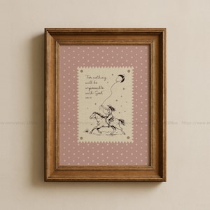 May include: Framed print featuring a sepia-toned illustration of a cowgirl roping a star. The image is set against a pink dotted background and includes the text "For nothing will be impossible with God" from Luke 1:37.