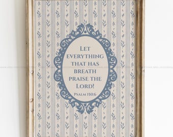 Puede incluir: Una impresión enmarcada con un fondo estampado en azul y blanco. La impresión presenta un marco ovalado decorativo con el texto "Que todo lo que tiene aliento alabe al Señor! Salmo 150:6".