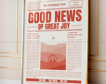 Puede incluir: Una impresión enmarcada con borde dorado presenta un diseño estilo periódico en rojo y blanco. El titular dice "GOOD NEWS OF GREAT JOY". La impresión incluye texto sobre esperanza, paz y reflexión, con una ilustración del nacimiento.