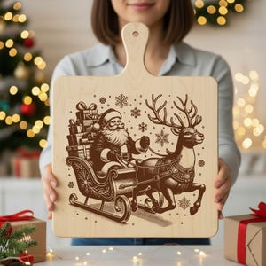 May include: A wooden cutting board with a handle, featuring a brown illustration of Santa Claus in a sleigh pulled by a reindeer, surrounded by snowflakes. The sleigh is loaded with gifts, perfect for holiday decor or serving.