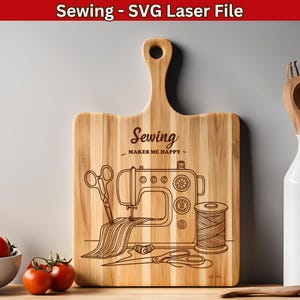 May include: A wooden chopping board with a laser engraved design of a sewing machine, thread, and scissors. The text "Sewing - Makes Me Happy" is also engraved on the board.
