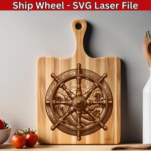 May include: A wooden cutting board with a laser-engraved design of a ship's wheel with waves. The wheel is brown and the waves are a lighter brown. The cutting board is made of light wood and has a natural grain.
