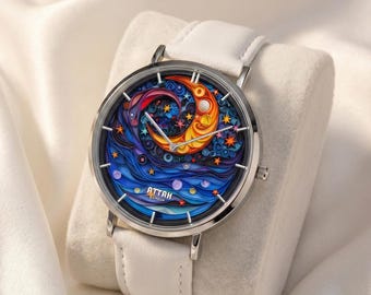 Reloj Celestial Moon Stars: Esfera con diseño de quilling, correa de cuero blanco.
