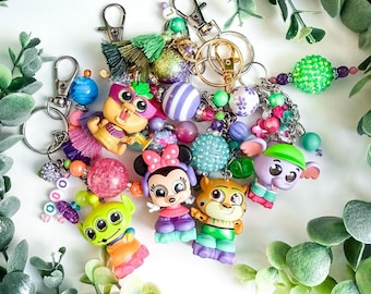 Let's Party Character Bag Charm | Disney Doorable Limited Edition Keychain | Minnie Mouse Keychain | Zootopia Bag Charm