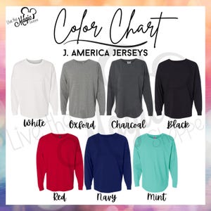 Puede incluir: Tabla de colores de camisetas J. America en blanco, gris Oxford, carb&oacute;n, negro, rojo, azul marino y menta. Se muestra el texto "Color Chart" y "J. AMERICA JERSEYS". El logotipo "Live the Magic Shoppe" est&aacute; en la esquina superior izquierda.
