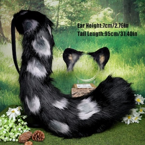 May include: A black and white faux fur tail with matching ear headband. The tail is 95cm long and has white spots. The ear height is 7cm. The text on the image reads: Ear Height: 7cm/2.76in, Tail Length: 95cm/37.40in.