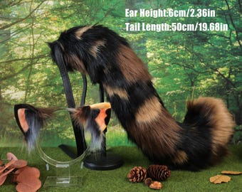 May include: A faux fur fox tail and ear set. The tail is brown, black, and tan, measuring 19.68 inches long. The ears are on a headband with orange, gray, and brown accents. The ear height is 2.36 inches.