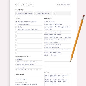 May include: A printable daily planner with a black and white design. The planner includes sections for top three priorities, to do list, schedule, meals and water, wellness, and notes. The planner is dated April 20th, Monday.