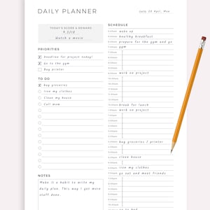 May include: A printable daily planner with a blue and white color scheme. The planner includes sections for priorities, to-do list, schedule, and notes. The planner is dated April 20th, Monday. The text "EXAMPLE" is at the top of the page.