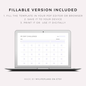 May include: A laptop computer displaying a printable 30-day challenge tracker. The tracker has fields for a goal, reward, and date. The tracker is formatted as a calendar with 30 numbered squares.