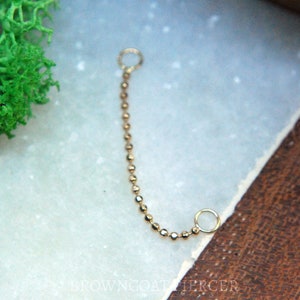 Tish Lyon Catena con perline in oro giallo 14 kt - Decorativa - 25 mm o 35 mm - accessorio per piercing, piercing al corpo, cura delle orecchie