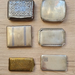 Astucci per sigarette vintage e scatola di tabacco