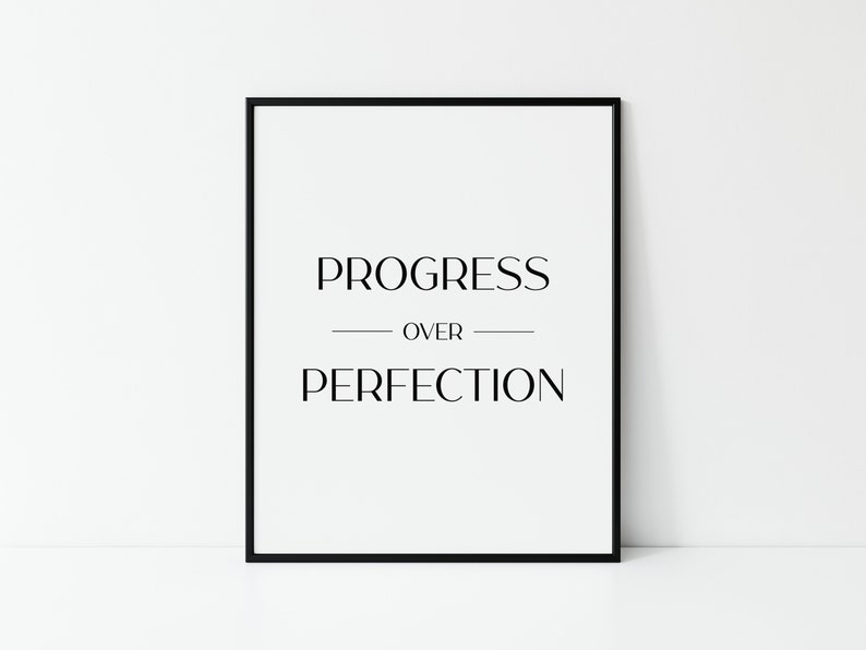 May include: Black and white printable wall art with the text "PROGRESS OVER PERFECTION" in a minimalist style.