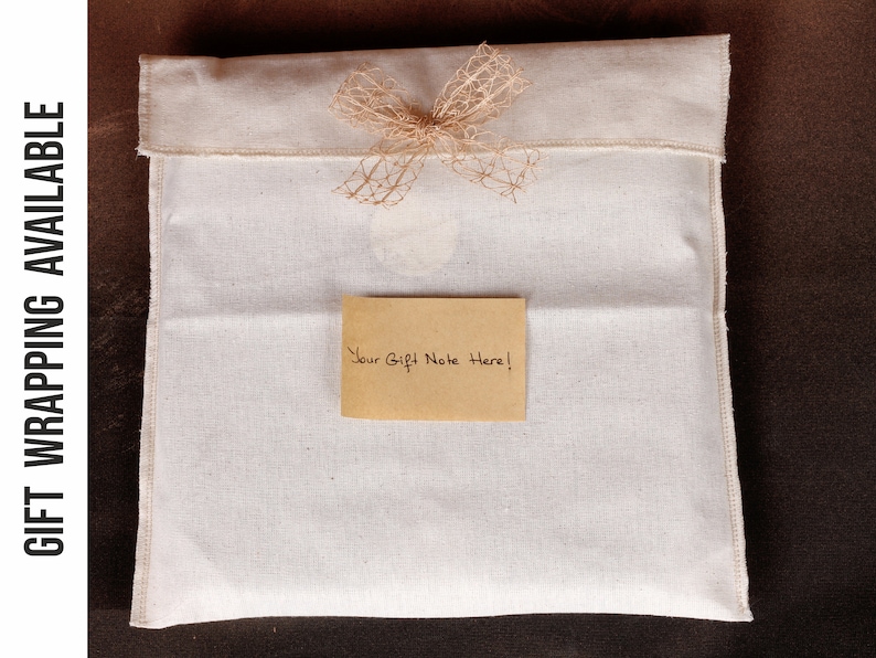 May include: A white cotton gift bag with a brown burlap bow and a brown paper gift note that says "Your Gift Note Here!"