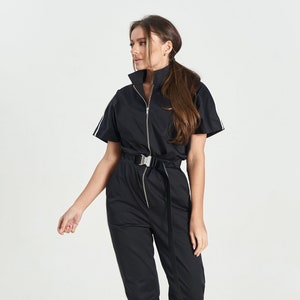 Zwarte modieuze overall schoonheidsspecialiste jumpsuit voor spa specialisten salon uniform voor kappers, cosmetologie doek voor schoonheidsspecialiste