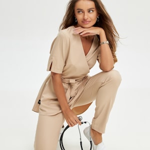 Uniforme pour esthéticienne Uniforme de spa de haute qualité Uniforme de gommage pour médecin Ensemble de gommage confortable pour dentistes et infirmières Uniforme de gommage pour infirmière