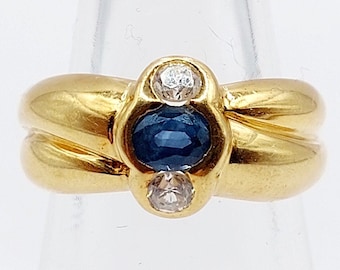 French knot ring 18k gold set with a sapphire and 2 white stones imitating diamond art deco