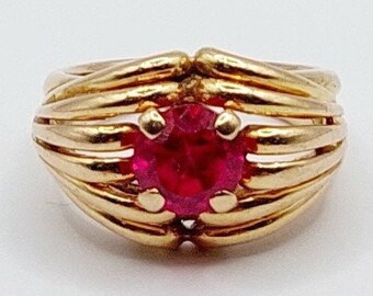 French domed ring 18k gold set a 1 carat round ruby in claw setting (circa 1950)